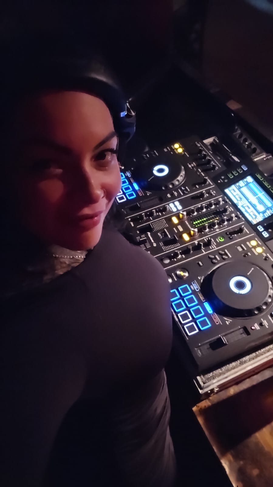 ALVORÁ performing a techno set behind the DJ booth